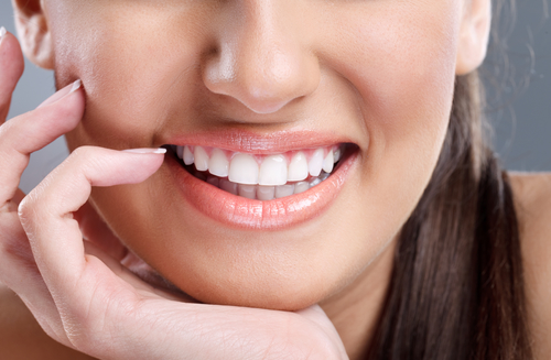 close up, beautiful young woman with big healthy smile